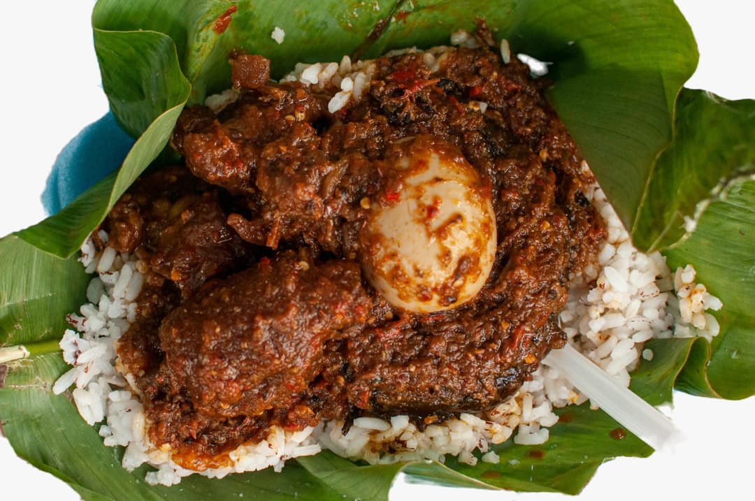 Chef plating Nigerian food